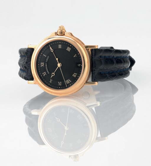 BREGUET. AN 18K GOLD AUTOMATIC WRISTWATCH WITH CENTER SECONDS AND DATE